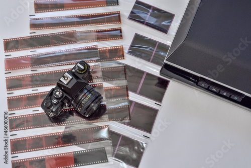 Film photography and scanning photo negatives using a scanner. Film camera with films negative various formats and scanner for scanning and digitizing analog images.