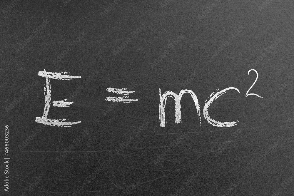 Relativity equation E mc2 handwritten by chalk on a university ...