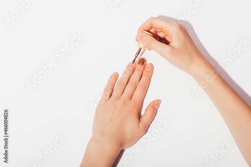 Female hands doing manicure
