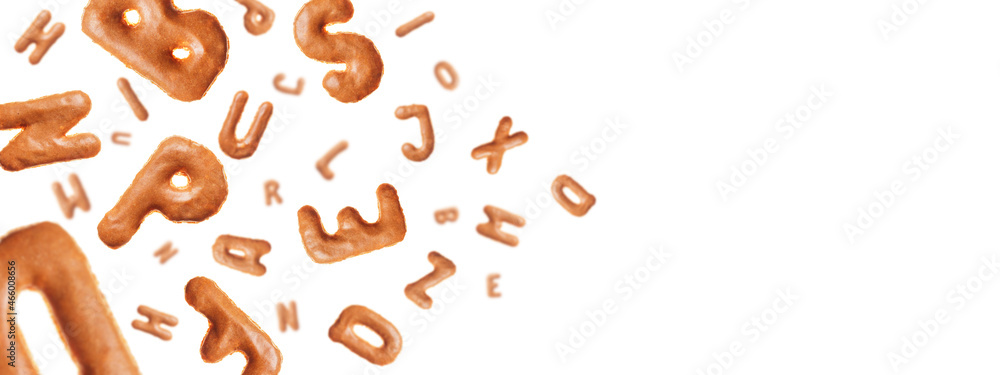 Chaotic flying letters made of real cookies, isolated on white background, closeup with space for text Chaotic flying letters made of real cookies, isolated on white background, closeup with space for text