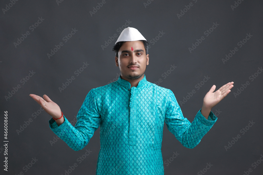 Young indian man (pilgrim) in traditional wear. Young indian man (pilgrim) in traditional wear.