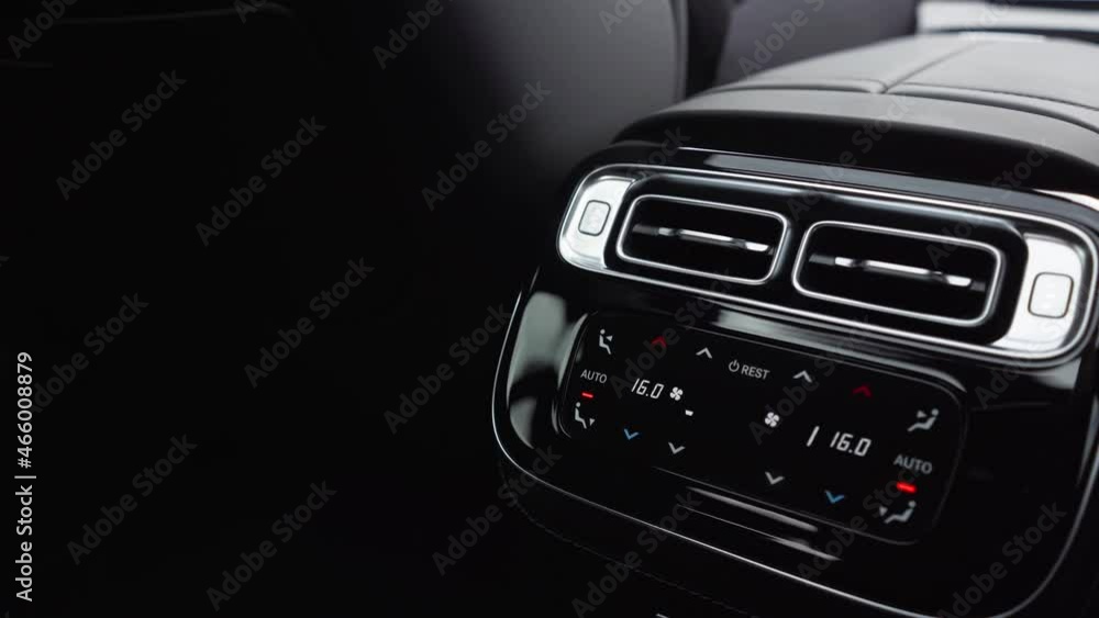 Close-up of the air duct of the rear passenger of a premium car. Close-up of the air duct of the rear passenger of a premium car.