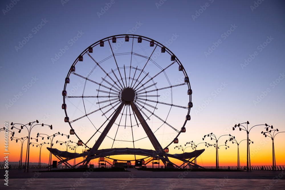 Baku. Azerbaijan. Ferris wheel at sunrise.