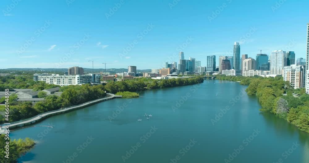 Austin Texas Colorado River and Lady Bird Lake with Boardwalk and Downtown Skyline with Paddleboards Next to Ann and Roy Butler Hike and Bike Trail (Aerial Drone View in 4k) Austin Texas Colorado River and Lady Bird Lake with Boardwalk and Downtown Skyline with Paddleboards Next to Ann and Roy Butler Hike and Bike Trail (Aerial Drone View in 4k)