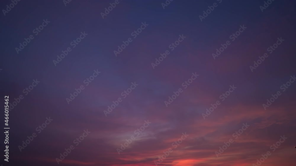 Time lapse of sunset sky. Abstract nature background. Dramatic blue with orange colorful clouds in twilight time. Time lapse of sunset sky. Abstract nature background. Dramatic blue with orange colorful clouds in twilight time.