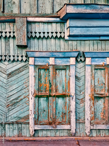 Carved platbands of old wooden windows