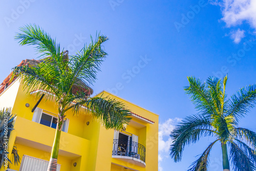 Fototapeta Naklejka Na Ścianę i Meble -  Typical orange residence hotel condominium building Playa del Carmen Mexico.