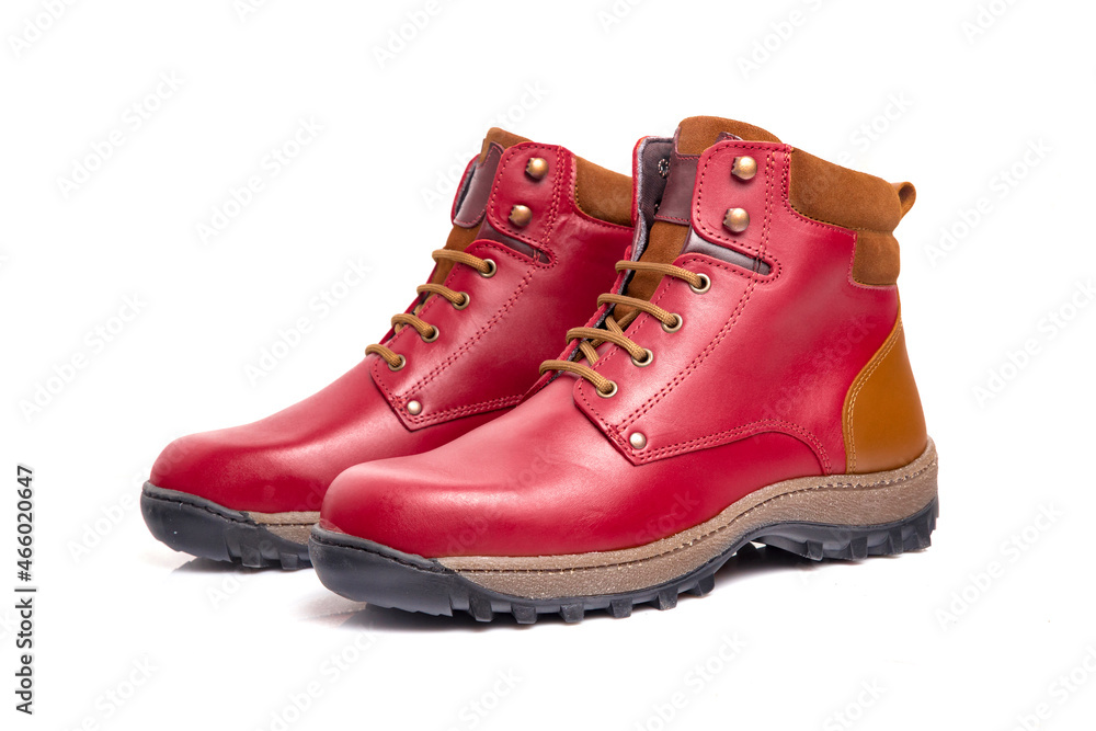 Men's leather boot in various colors on a white background. Men's leather boot in various colors on a white background.