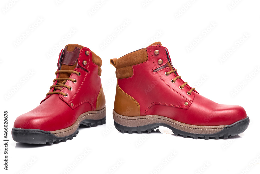 Men's leather boot in various colors on a white background. Men's leather boot in various colors on a white background.