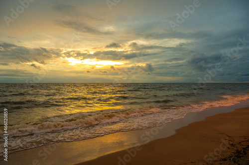 Fototapeta Naklejka Na Ścianę i Meble -  Sunset of Bang Saen Beach in Chonburi, famous beach for local tourists near Bangkok, Thailand