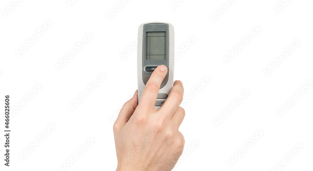 hand pressing button on remote control isolated on white, controlling hand pressing button on remote control isolated on white, controlling