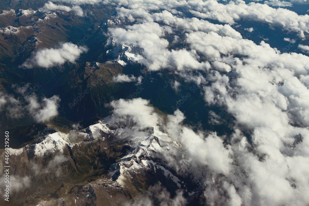 Mountains under clouds, aerial survey. Caucasus, Krasnodar Territory, Russia