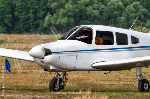 Private single-engined piston-powered airplane taxiing at the airfield