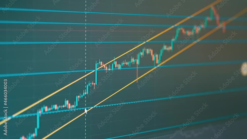 Candlestick Chart of Movement of Cryptocurrency on Screen of a Monitor PC. Online trading BTC, dollar. Range trading analysis, value area, quotes on black color background. Financial, stock market. Candlestick Chart of Movement of Cryptocurrency on Screen of a Monitor PC. Online trading BTC, dollar. Range trading analysis, value area, quotes on black color background. Financial, stock market.