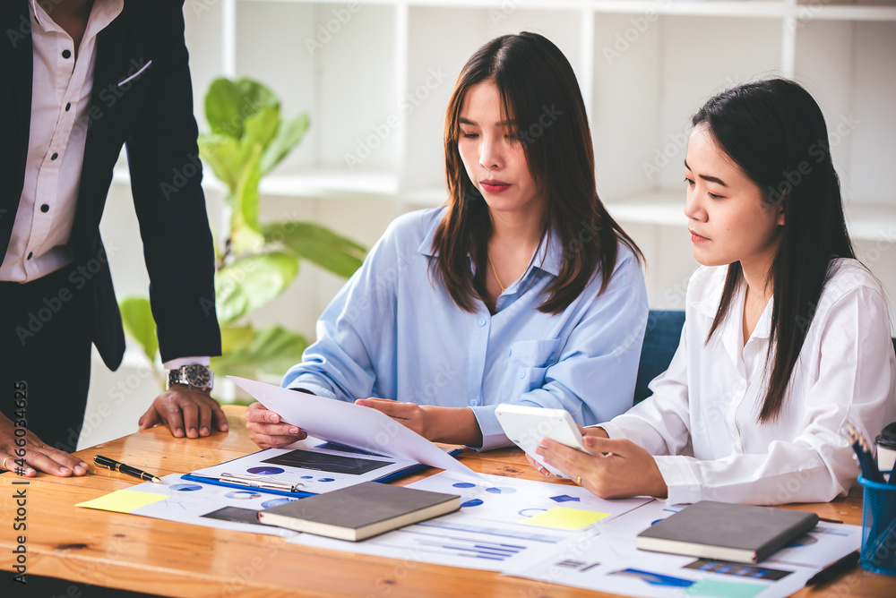 Team work with business analytic price chart on the table at the conference room. Team work with business analytic price chart on the table at the conference room.