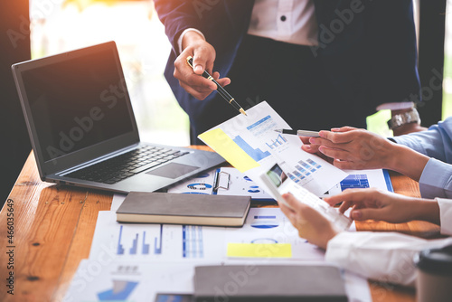 Team work with business analytic price chart on the table at the conference room.