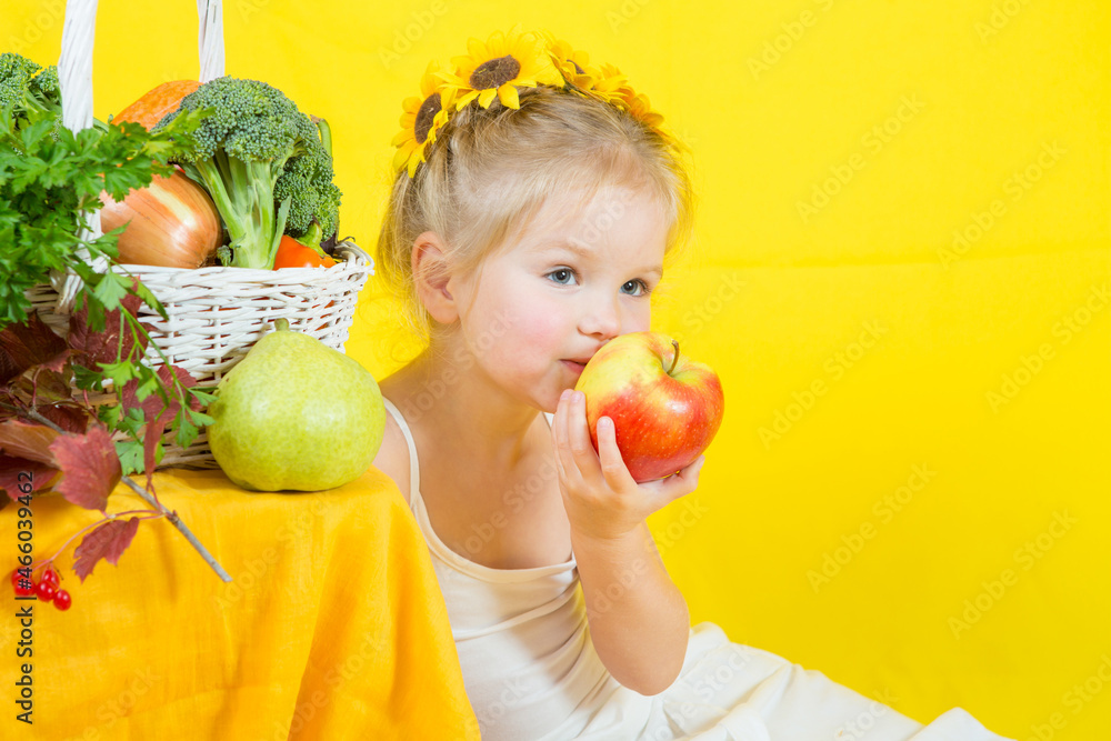Beautiful little happy girl with basket vegetables and fruits Beautiful little happy girl with basket vegetables and fruits