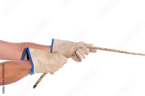 Hands with safety gloves pulling a rope, isolated on white background. Hand protection.