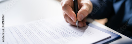 Lawyer Signing Business Contract Legal Document photo