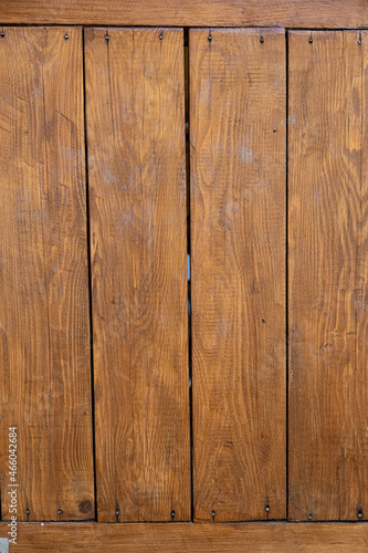Wooden background texture of natural color boards without paint. The background is made of wood for photography. Concept - background of boards