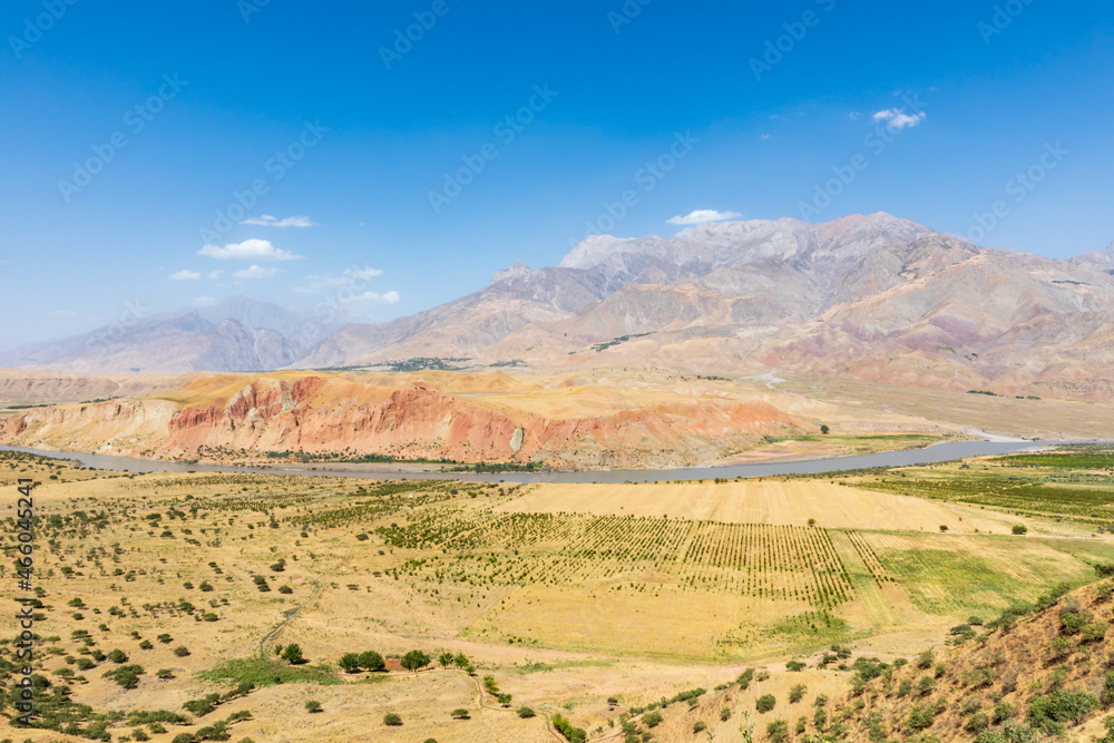 Large mountains and the Panj River valley.