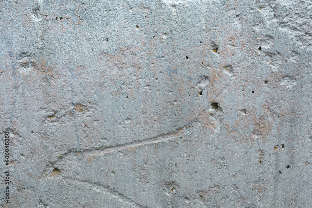 Background light gray concrete wall with craquelure Background light gray concrete wall with craquelure