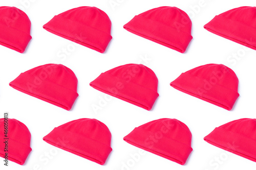 Bright pink stylish beanie hat made of natural eco fabric with texture.