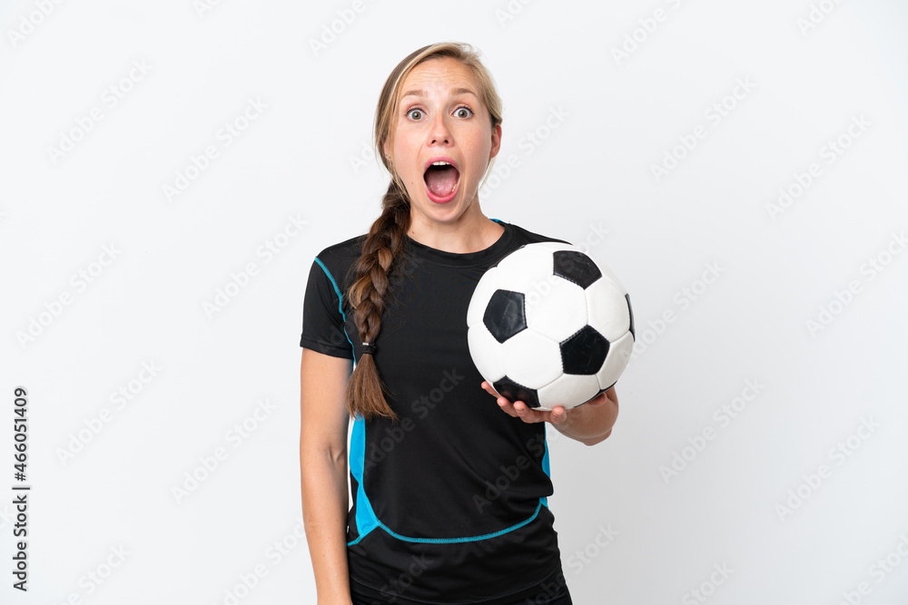 Young football player woman isolated on white background with surprise facial expression