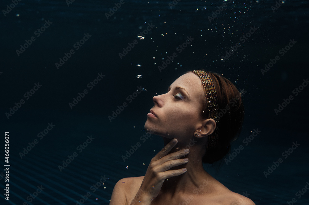 Mermaid. Portrait of young beautiful woman underwater. Mermaid. Portrait of young beautiful woman underwater.