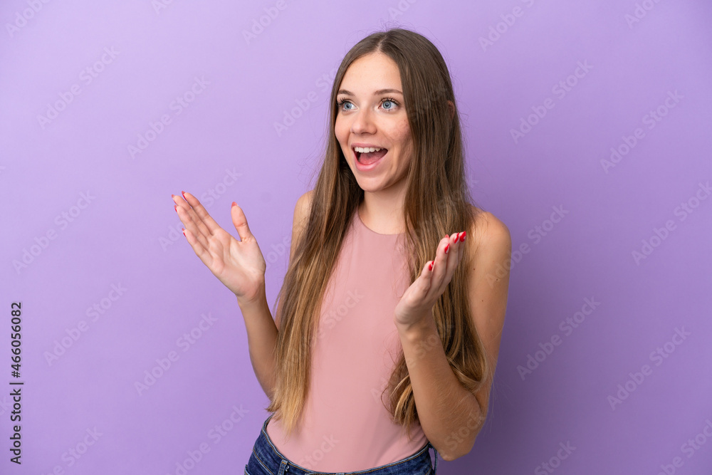 Young Lithuanian woman isolated on purple background with surprise facial expression Young Lithuanian woman isolated on purple background with surprise facial expression