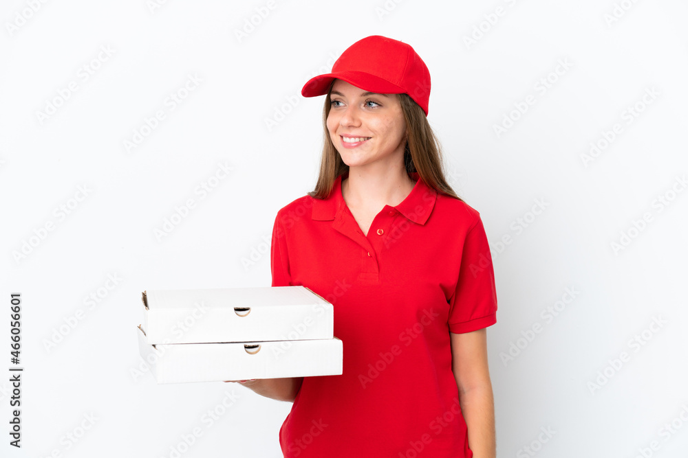 Pizza delivery Lithuanian woman isolated on white background looking side Pizza delivery Lithuanian woman isolated on white background looking side
