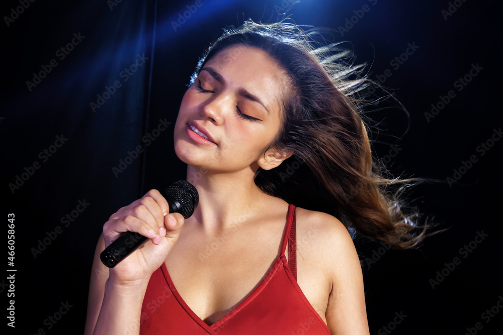 singing woman in red dress singing woman in red dress