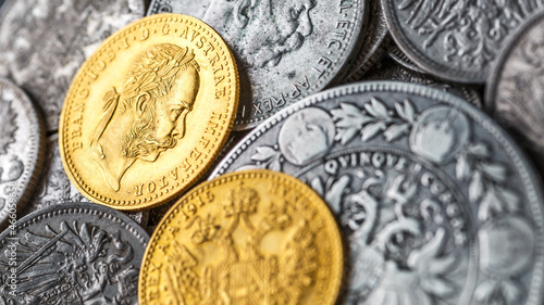 Austro-Hungarian Empire or the Dual Monarchy Gold coins - Close up.Old gold and silver Austrian coins of the 19th century.coin showing austrian emperor Franz Joseph,