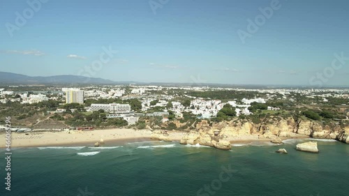 Aerial seascape view of Alvor prainha cliffs and cape João de Arens, tourist destination in Western Algarve Coast, Portugal. photo