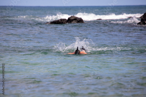 snorkeling in the blue ocean water