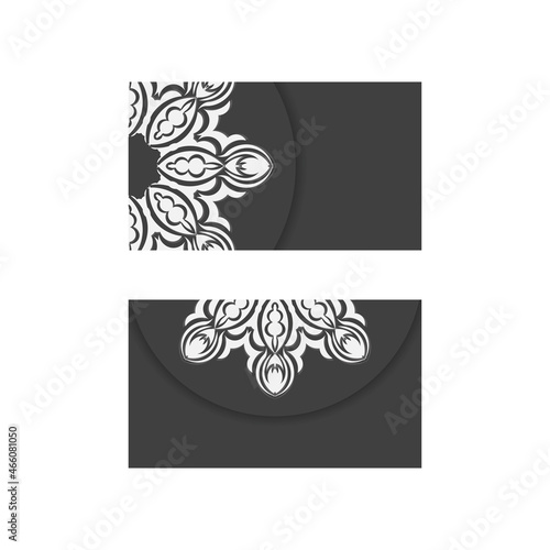 Black business card with mandala white ornament for your contacts.