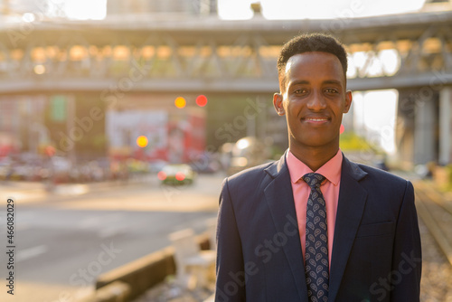Wallpaper Mural Portrait of successful young African businessman wearing suit and tie while smiling Torontodigital.ca