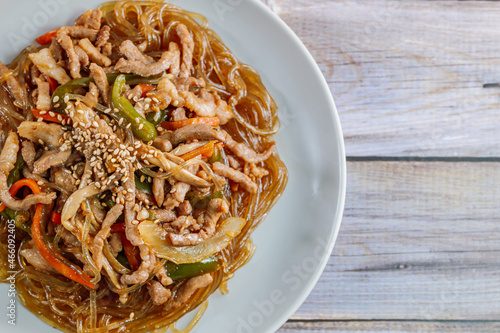 Korean style stir-fried glass noodles pork and vegetables