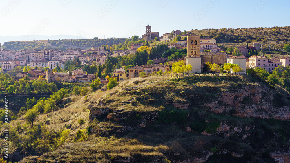 Old mountain village above the ravine on a sunny fall day. Sepulveda, Segovia.