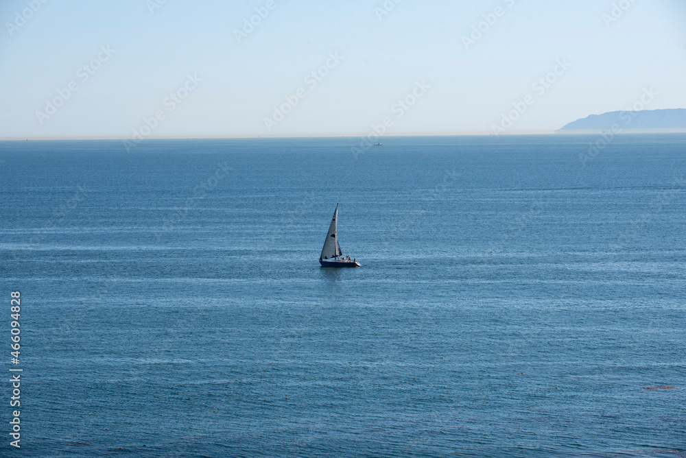Sailboat in the ocean on a beautiful summer day