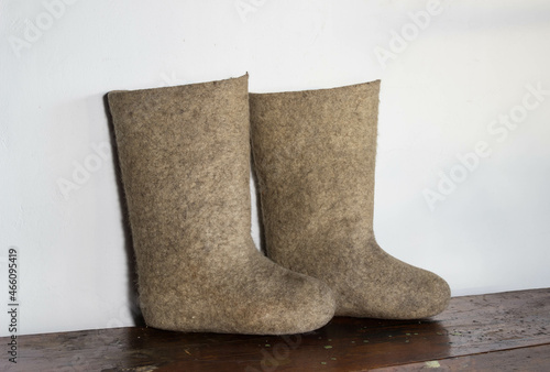 shoes of the peoples of Siberia and the north, felt boots made of natural wool in gray, shoes made by hand, in a traditional style photo