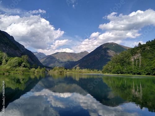 Landscape in the Valley of Boí. Mirror reflection in the Reservoir of Cardet. Pyrenees Mountains. Catalonia. Spain.