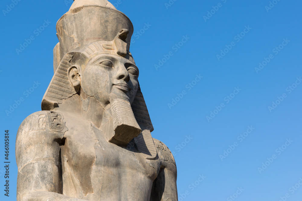 Statue of Ramesses II at Luxor temple with copy space - obrazy, fototapety, plakaty 