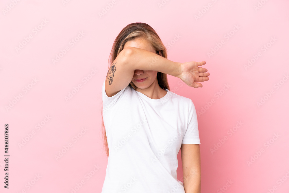 Young English woman isolated on pink background covering eyes by hands Young English woman isolated on pink background covering eyes by hands