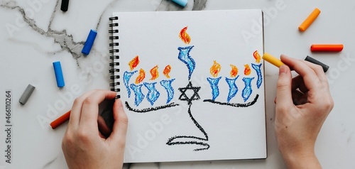 Celebration card with menorah (traditional candelabra) and candles for Happy Hanukkah jewish holiday drawing by child. Banner. 