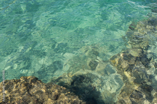 clear turquoise blue water texture and reflections in the Mediterranean Sea minimalist aqua background