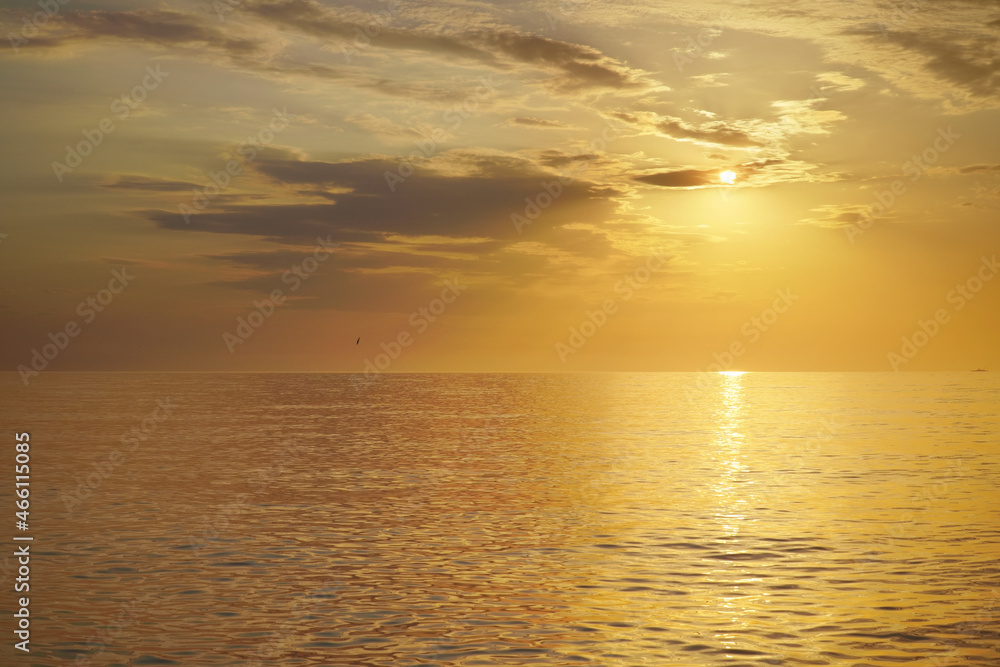 Golden sunset sea background.