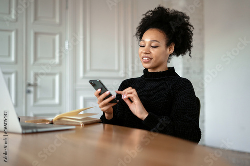 Blogger surf the internet. Prints a message to the mail. A freelancer communicates on a social network with subscribers. Student online education application. The woman uses the phone.