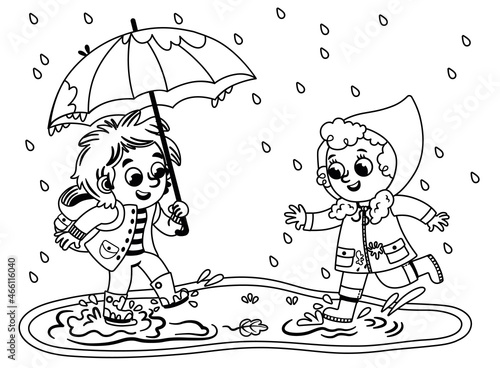 Black and white two kids having fun under the rain.