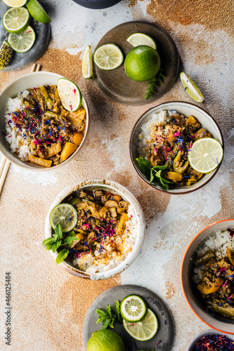 Delicious traditional asian curry in bowls.